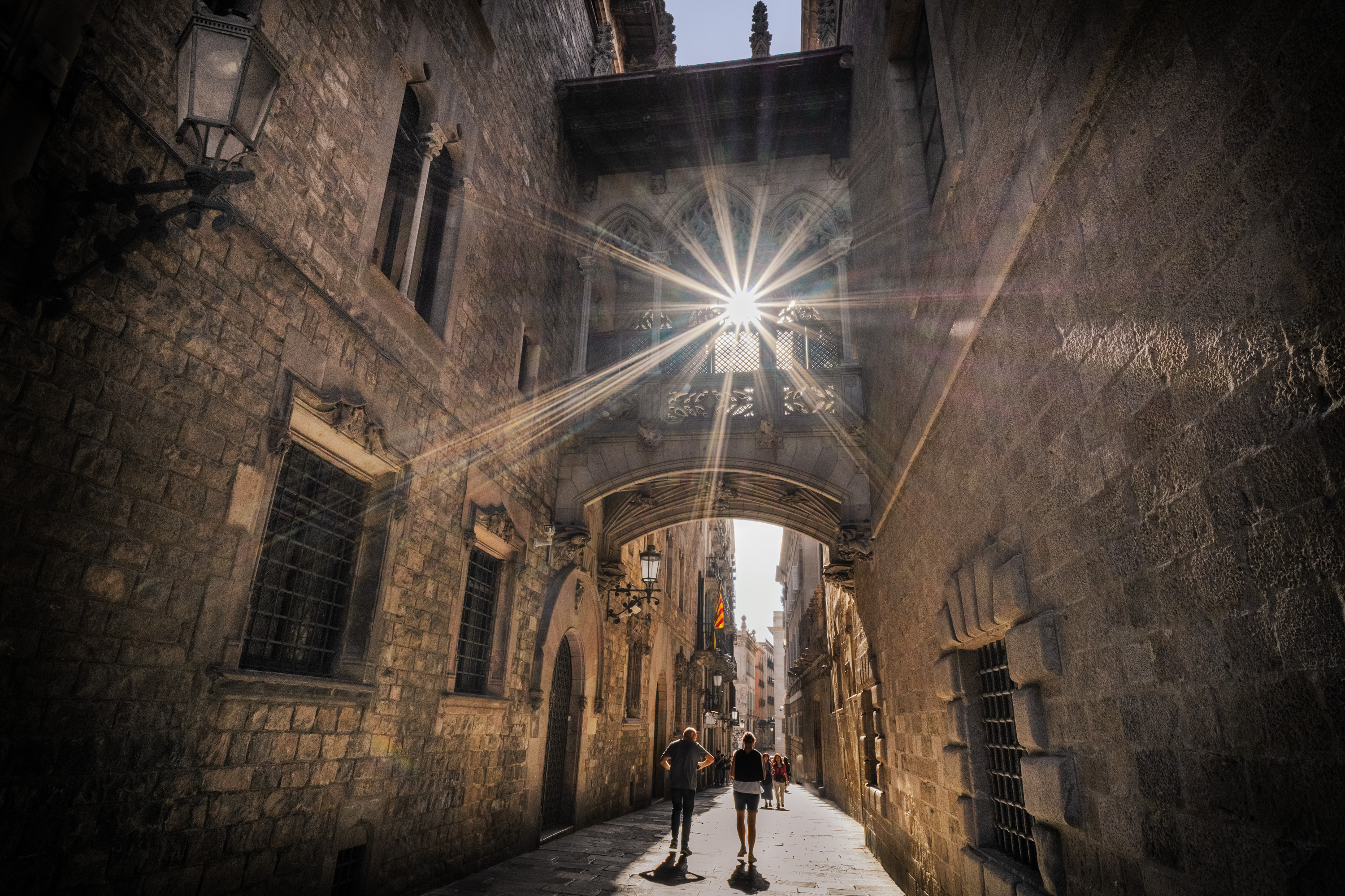 Atmospheric narrow street in Barcelona Gothic Quarter at dusk - Raw Tours photo tour