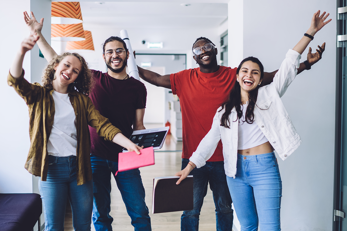 4 people welcoming with open arms
