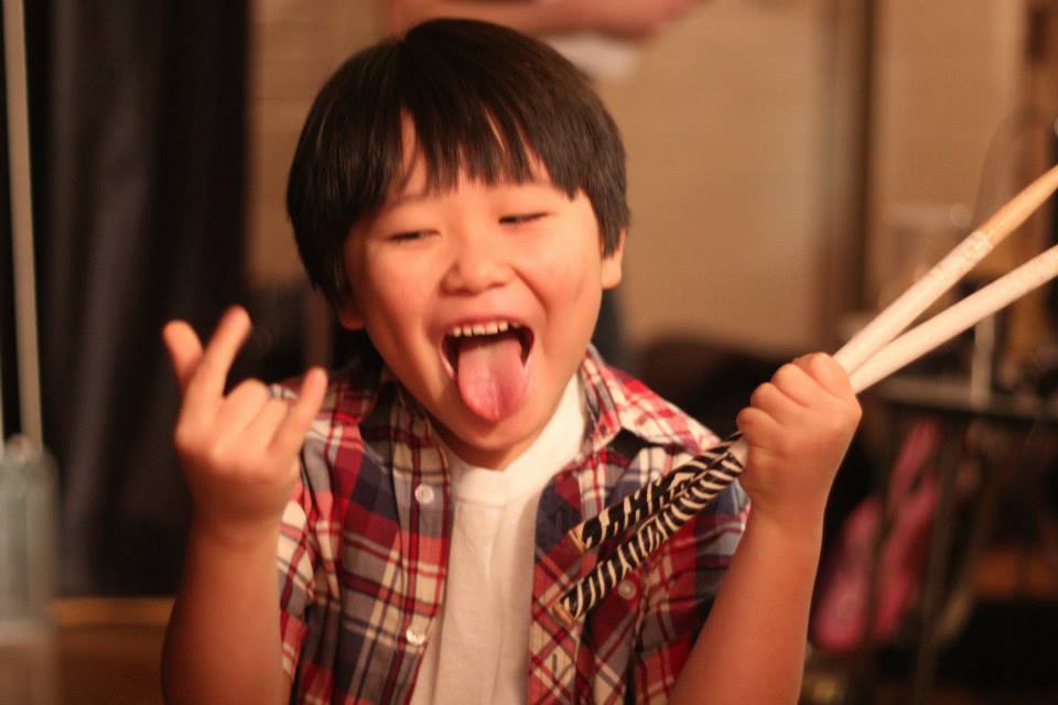 Beginner drum student learning drums during private lesson at Real Brave music school