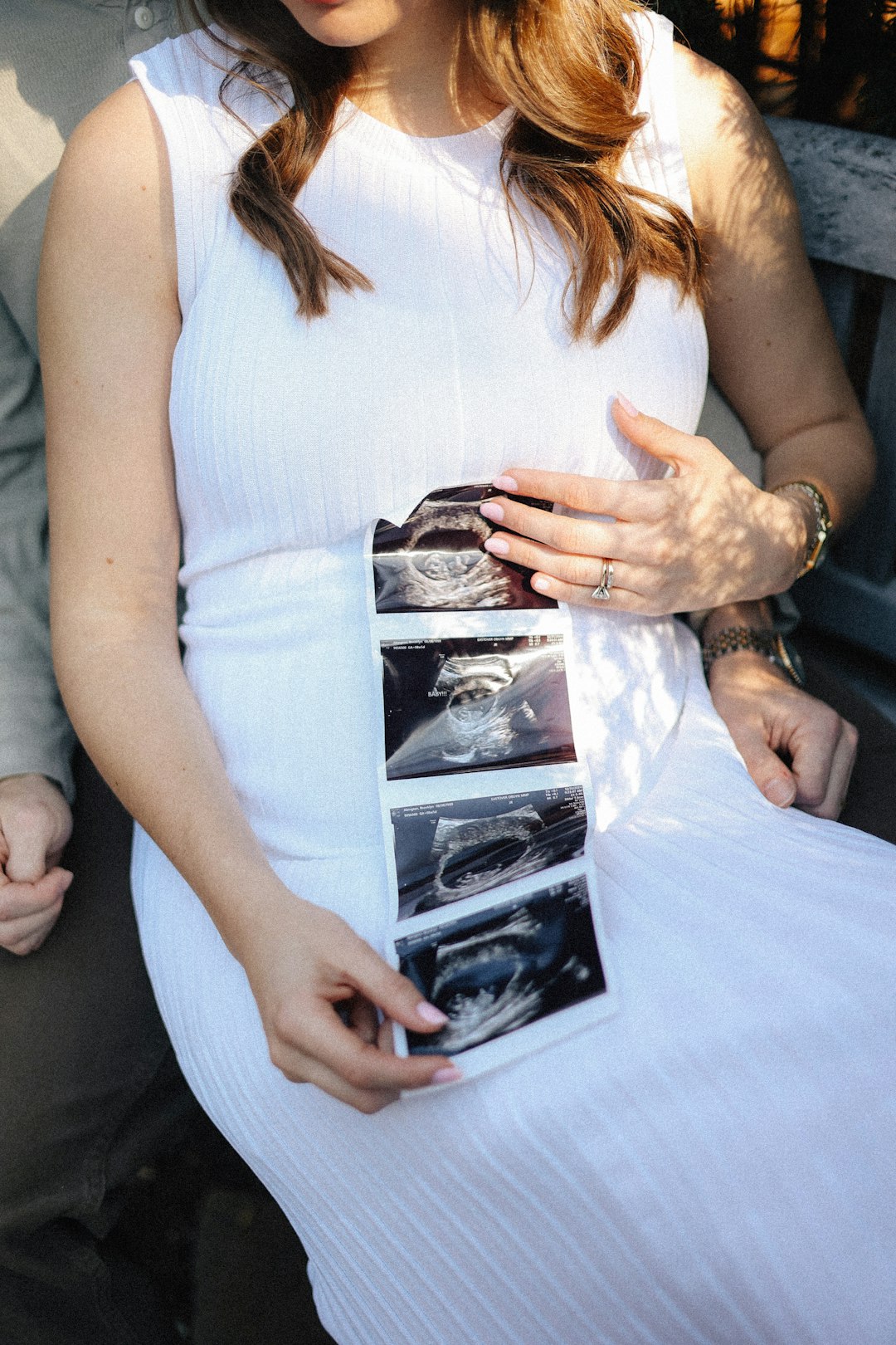woman holding ultrasound scan