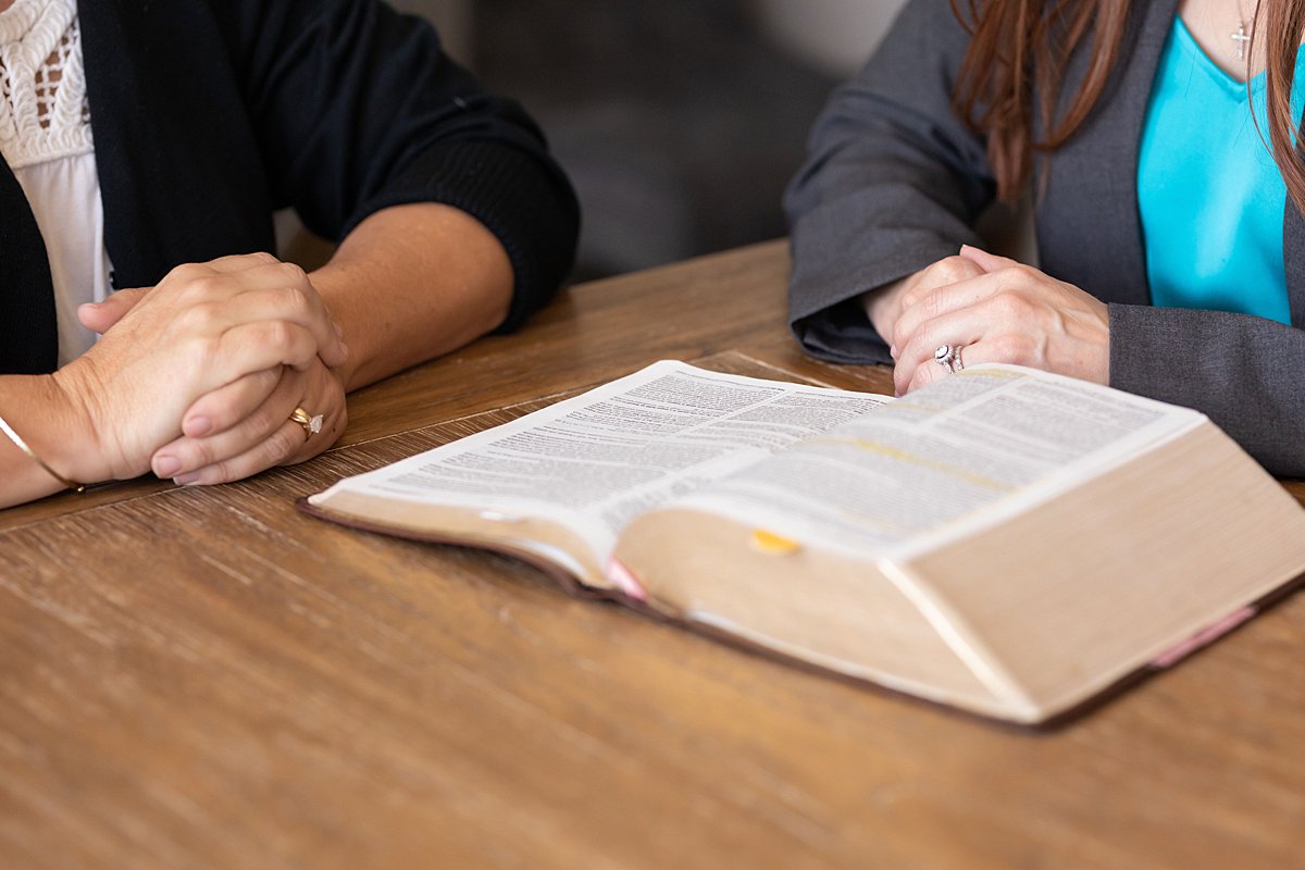 leaders praying together in the workplace