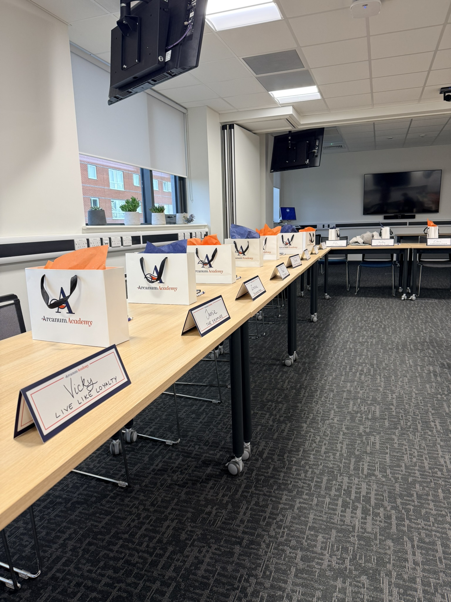 A conference room set up for a skills bootcamp programme.