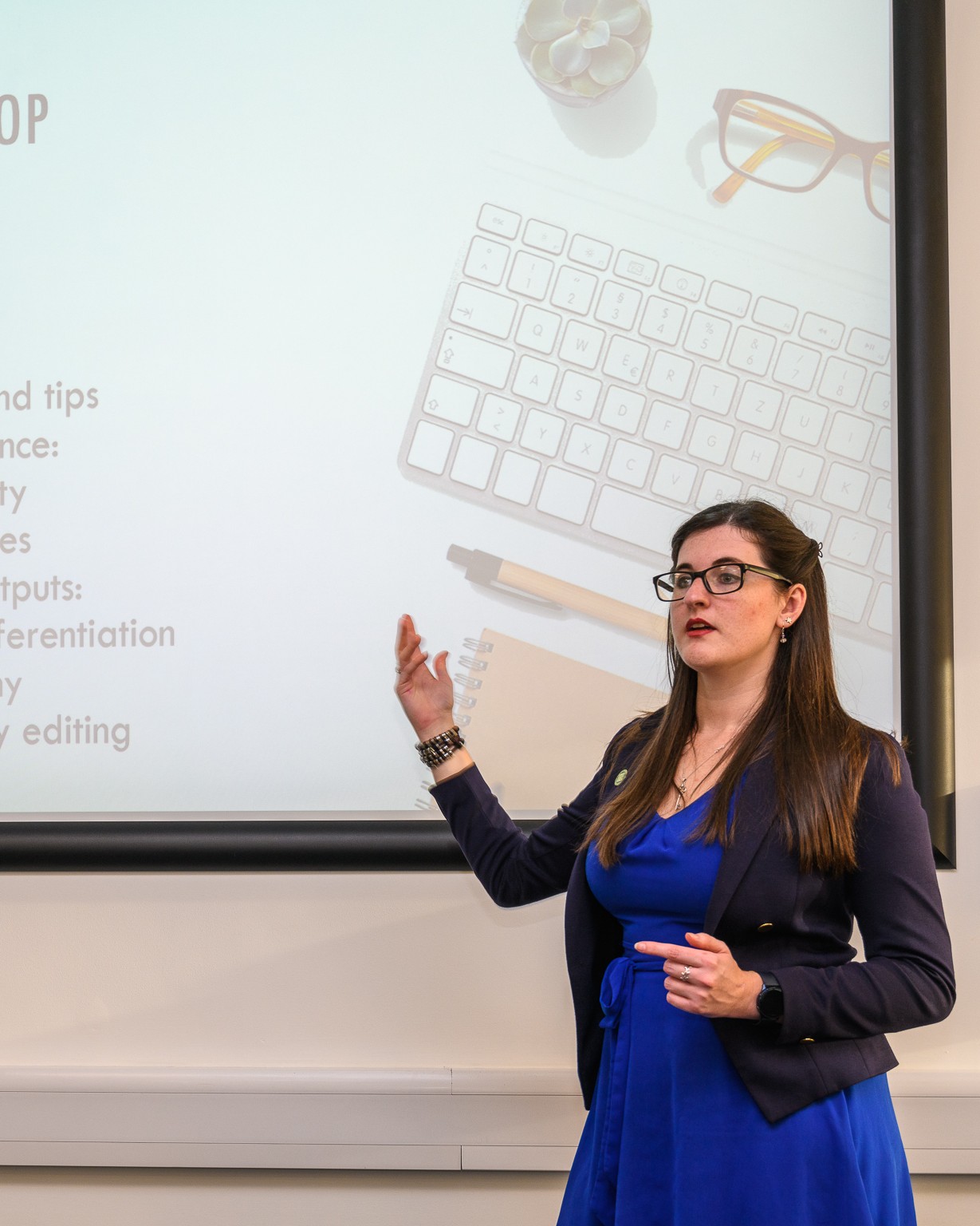 Eleanor Bryan delivering a conference presentation.