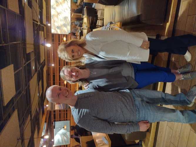 Picture of Weston Lyon and Jenny B. Lyon having dinner with their client Anne Beiler, Founder of Auntie Anne's Pretzels